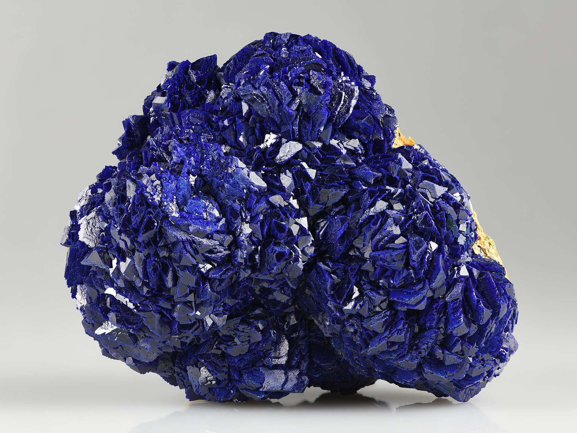 Malachite mineral specimen — Blue crystals of azurite covering matrix (4.0 × 3.0 × 2.0 cm) with minor malachite. Found from New N
