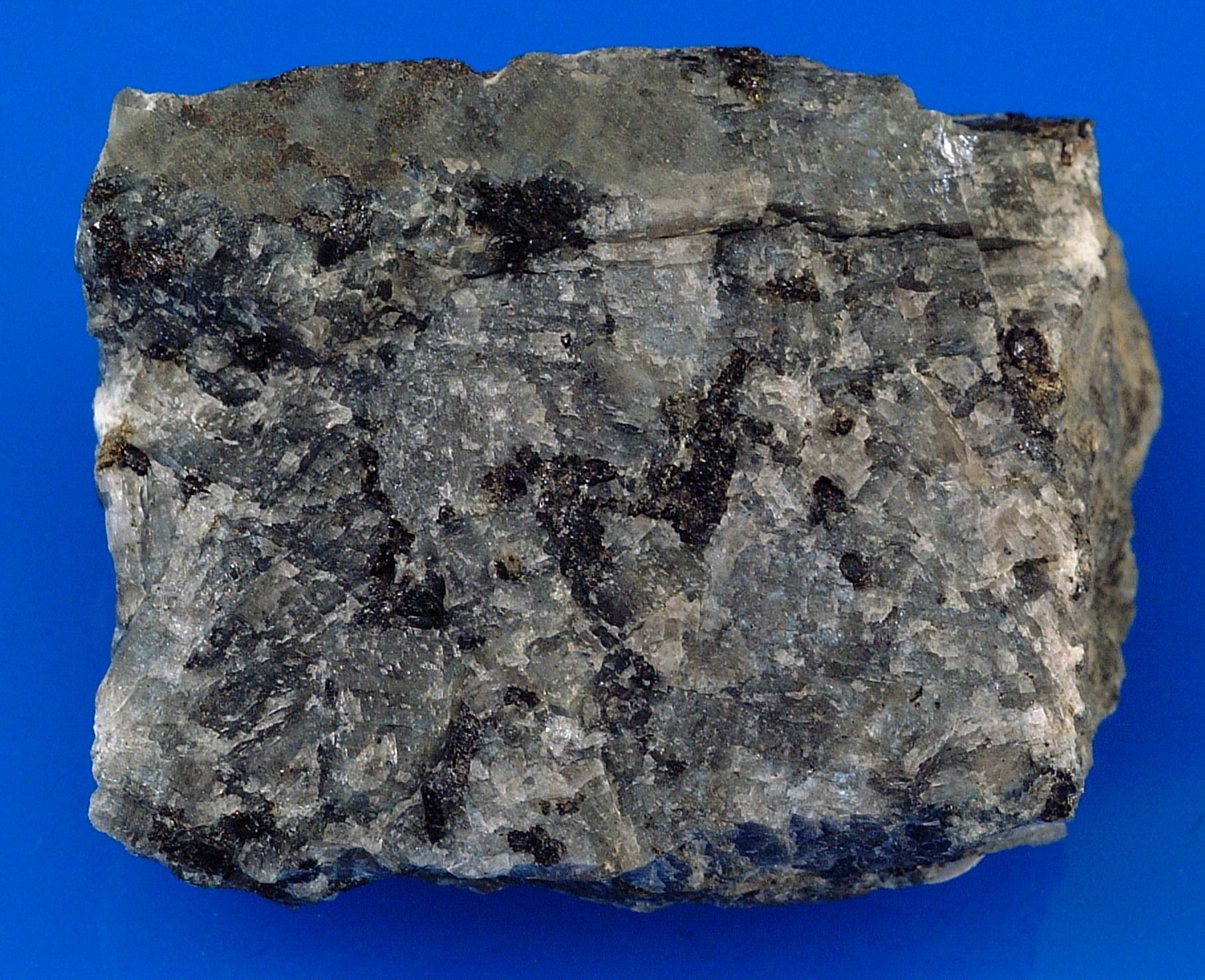 Moonstone mineral adularescence mineral specimen — Anorthoclase, KAlSi3O8 (potasium aluminum silicate), is a polymorph of other minerals that share the