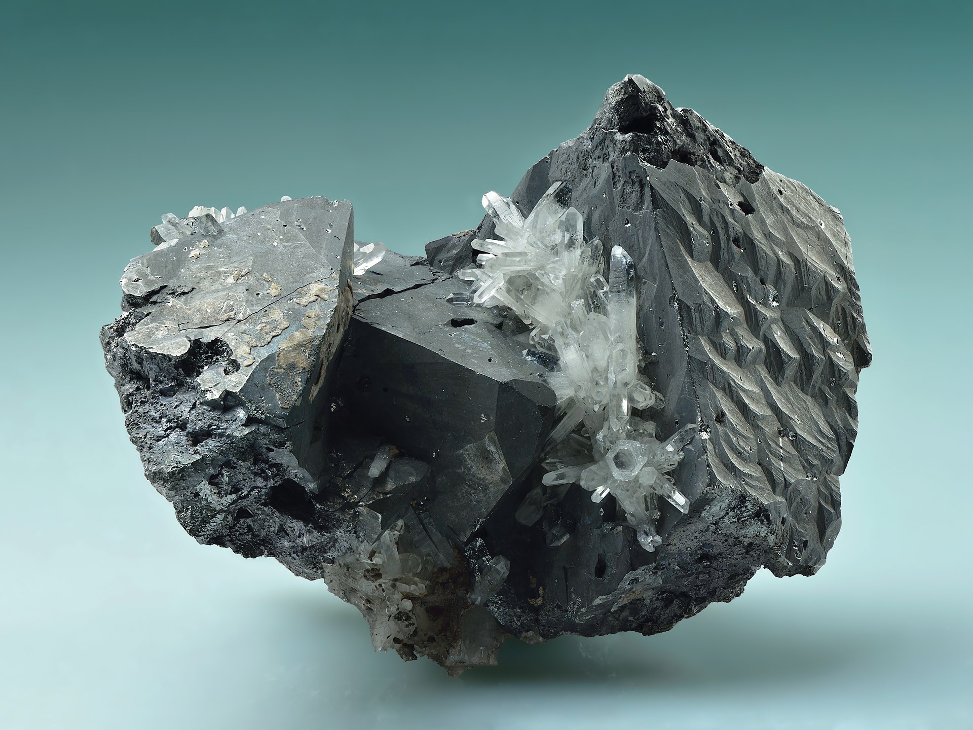 Quartz crystal mineral specimen — Crystals of tetrahedrite up to 2.2 cm in size forming a cluster (3.5 × 2.5 × 2.5 cm) with quartz and