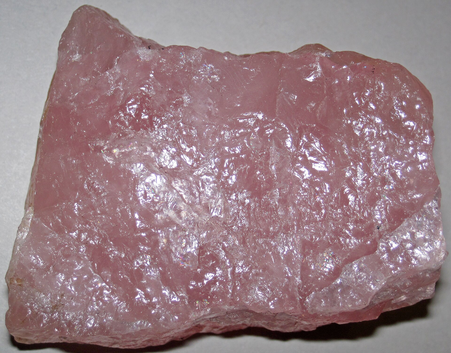 Rose quartz mineral specimen — A mineral is a naturally-occurring, solid, inorganic, crystalline substance having a fairly definite