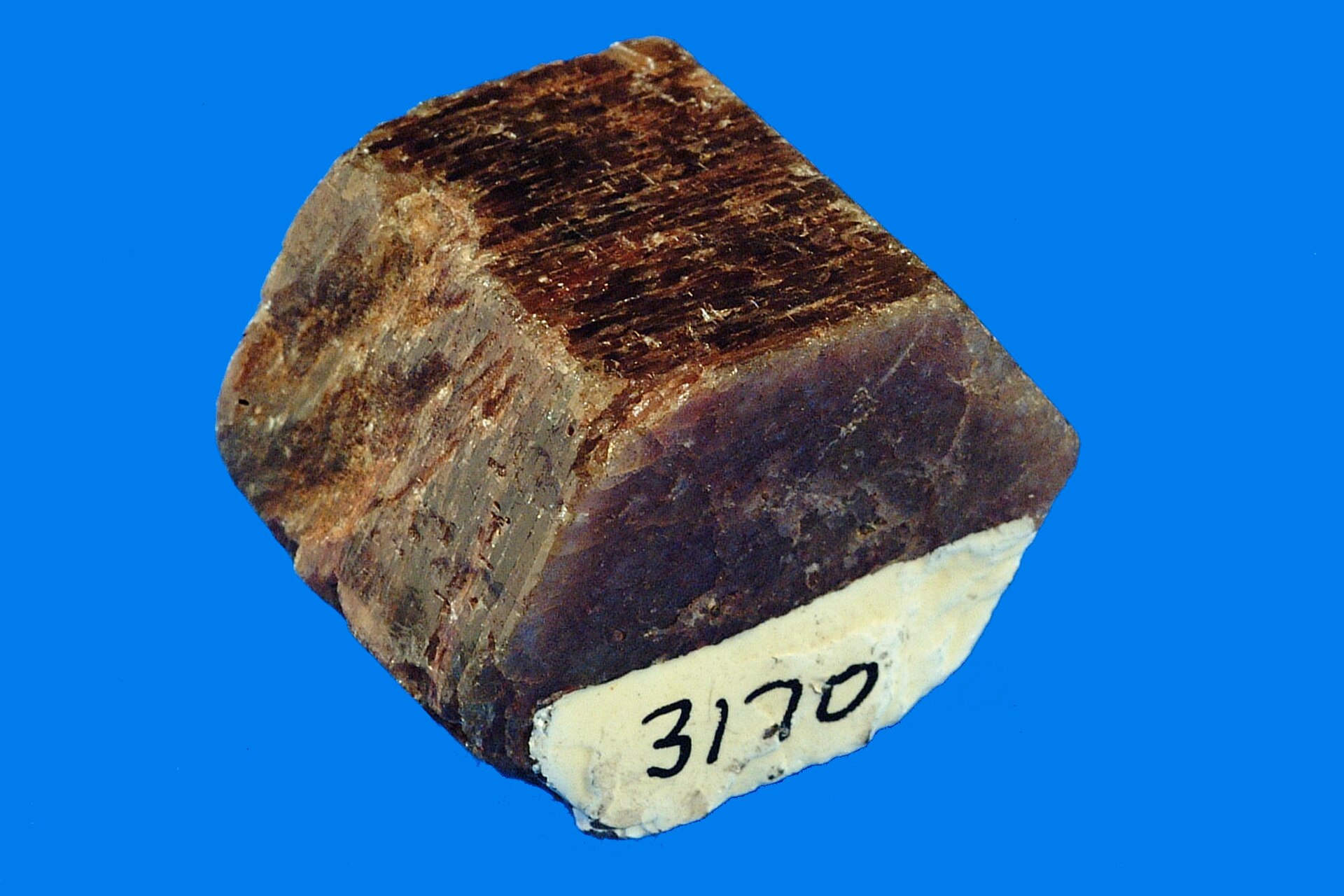 Ruby gemstone mineral specimen — Corundum, Al2O3 (aluminum oxide), is one of the hardest minerals. It is used as an abrasive and when