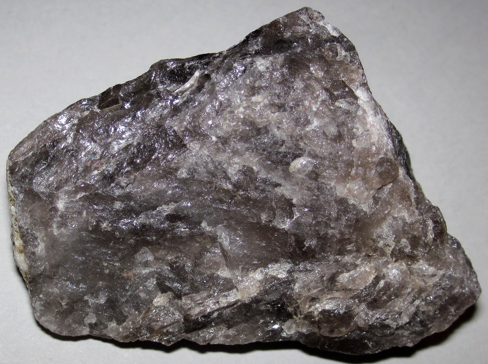 Smoky quartz mineral specimen — A mineral is a naturally-occurring, solid, inorganic, crystalline substance having a fairly definite