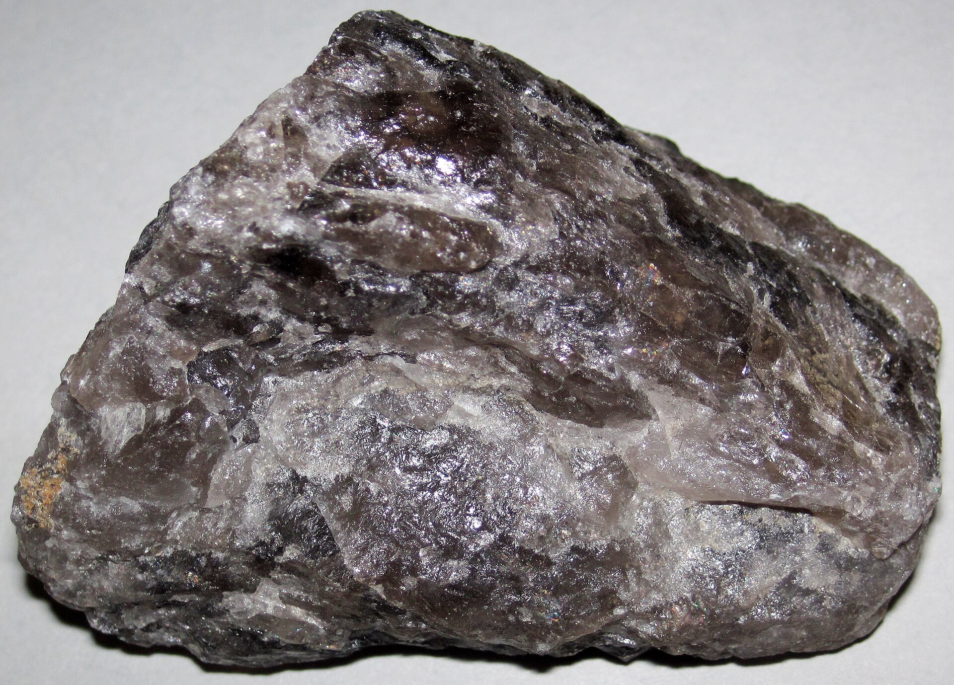 Smoky quartz mineral specimen — A mineral is a naturally-occurring, solid, inorganic, crystalline substance having a fairly definite